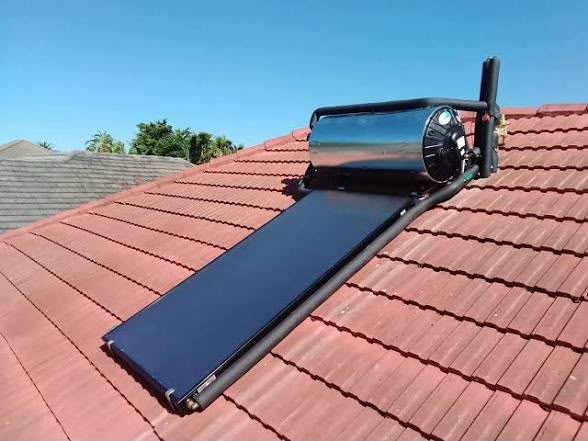 A Tru Africa solar geyser installed on a tiled roof